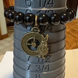 Black 10mm Glass Beaded Stretch Bracelet with Alice in Wonderland Charm